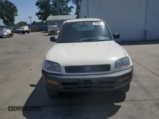 1996 Toyota RAV4 with VIN JT3GP10V3T0005875, listed as a Copart auction lot 57359135 with 240,763 mi miles and Salvage Title. Bid and sale history available at DreamBid. Image 5.