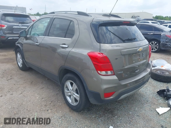 2020 Chevrolet Trax LT with VIN KL7CJLSB7LB351195, listed as a IAAI auction lot 42266365 with 64,257 mi miles and . Bid and sale history available at DreamBid. Image 3.