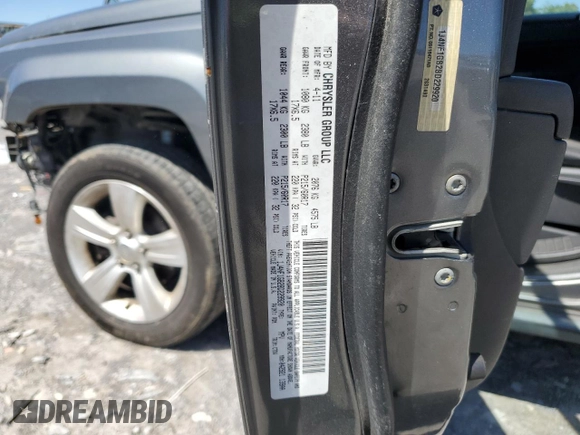2011 Jeep Patriot Latitude z VIN 1J4NF1GB2BD229920, wystawiony jako Copart lot #57548445 z przebiegiem 188 712 mil mil oraz Szkoda całkowita • Salvage title. Historia ofert i sprzedaży dostępna na DreamBid. Obrazek 13.