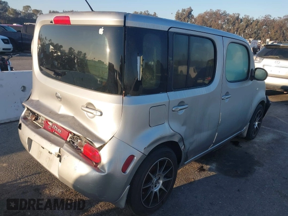 2011 Nissan Cube S z VIN JN8AZ2KR6BT205720, wystawiony jako IAAI lot #41647157 z przebiegiem 154 116 mil mil oraz . Historia ofert i sprzedaży dostępna na DreamBid. Obrazek 4.