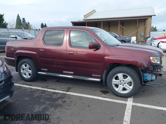 2009 Honda Ridgeline RTL with VIN 5FPYK16539B101836, listed as a IAAI auction lot 41894409 with 185,325 mi miles. Bid and sale history available at carsss.com. Image 14.