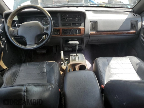 1996 Jeep Grand Cherokee Laredo z VIN 1J4GZ58S8TC222435, wystawiony jako Copart lot #62347665 z przebiegiem 202 125 mil mil oraz Czysty tytuł • Clean title. Historia ofert i sprzedaży dostępna na DreamBid. Obrazek 8.