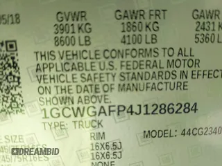 2018 Chevrolet Express Cargo Van with VIN 1GCWGAFP4J1286284, listed as a IAAI auction lot 41640914 with 98,691 mi miles. Bid and sale history available at carsss.com. Image 9.