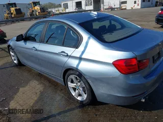 2013 BMW 3 Series 328i with VIN WBA3A5G5XDNP23336, listed as a IAAI auction lot 41895867 with 125,137 mi miles. Bid and sale history available at carsss.com. Image 3.