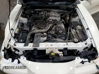 1996 Ford Mustang with VIN 1FALP4045TF168100, listed as a Copart auction lot 60464845 with 116,702 mi miles and Salvage title. Bid and sale history available at DreamBid. Image 11.