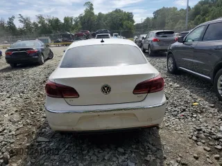 2014 Volkswagen CC Sport with VIN WVWBN7AN3EE528302, listed as a Copart auction lot 69636034 with 77,332 mi miles and Salvage Title. Bid and sale history available at DreamBid. Image 6.