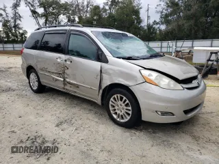 2009 Toyota Sienna XLE with VIN 5TDBK22C89S027706, listed as a Copart auction lot 88672015 with 215,515 mi miles and Salvage Title. Bid and sale history available at DreamBid. Image 4.