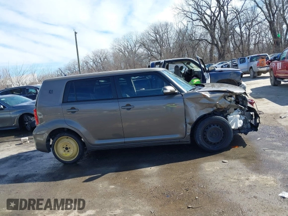 2012 Scion xB with VIN JTLZE4FE8C1144563, listed as a IAAI auction lot 41695722 with 220,706 mi miles and . Bid and sale history available at DreamBid. Image 14.