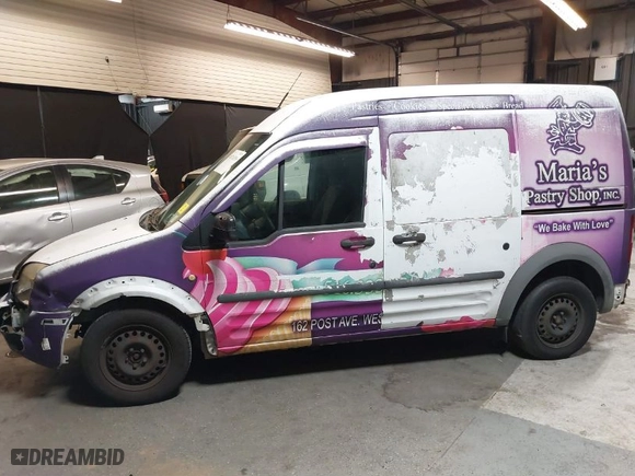 2011 Ford Transit Connect XLT with VIN NM0LS7BN0BT049898, listed as a IAAI auction lot 40714359 with 124,045 mi miles. Bid and sale history available at carsss.com. Image 14.