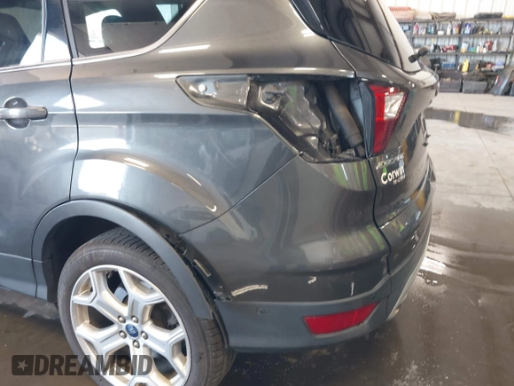 2019 Ford Escape Titanium with VIN 1FMCU9J97KUC55772, listed as a IAAI auction lot 42514001 with 77,737 mi miles and . Bid and sale history available at DreamBid. Image 18.