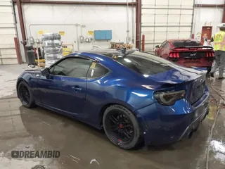 2013 Subaru BRZ Limited with VIN JF1ZCAC15D1603735, listed as a IAAI auction lot 42391716 with 94,330 mi miles and . Bid and sale history available at DreamBid. Image 3.