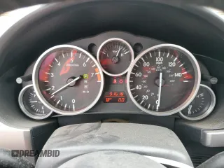 2009 Mazda MX-5 Miata Grand Touring z VIN JM1NC25F090202047, wystawiony jako Copart lot #55810505 z przebiegiem 91 618 mil mil oraz Szkody całkowita. Historia ofert i sprzedaży dostępna na DreamBid. Obrazek 9.