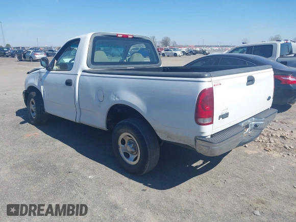 2002 Ford F-150 XL with VIN 1FTRF172X2NC07830, listed as a IAAI auction lot 41584706 with 143,255 mi miles. Bid and sale history available at carsss.com. Image 3.
