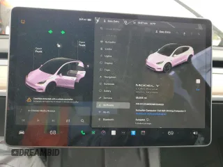 2021 Tesla Model Y Long Range z VIN 5YJYGDEE0MF254020, wystawiony jako Copart lot #51666865 z przebiegiem 25 805 mil mil oraz Szkody całkowita. Historia ofert i sprzedaży dostępna na DreamBid. Obrazek 9.