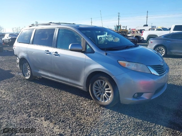 2012 Toyota Sienna XLE AAS with VIN 5TDYK3DC3CS240213, listed as a IAAI auction lot 41522822 with 147,903 mi miles. Bid and sale history available at carsss.com. Image 1.