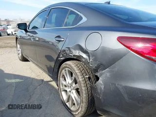 2015 Mazda 6 i Grand Touring with VIN JM1GJ1W55F1220578, listed as a IAAI auction lot 42076034 with 77,904 mi miles and . Bid and sale history available at carsss.com. Image 6.