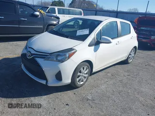 2015 Toyota Yaris L with VIN VNKKTUD37FA019862, listed as a IAAI auction lot 41481374 with 106,041 mi miles. Bid and sale history available at carsss.com. Image 2.