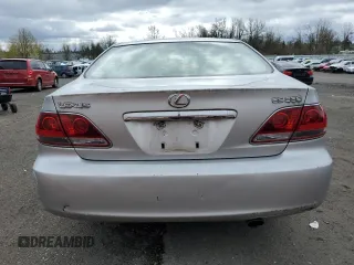 2005 Lexus ES 350 with VIN JTHBA30GX55077763, listed as a Copart auction lot 51572075 with 242,435 mi miles and Salvage Title. Bid and sale history available at DreamBid. Image 6.