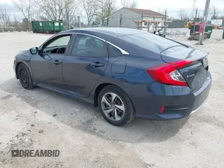2019 Honda Civic LX with VIN 2HGFC2F61KH564474, listed as a IAAI auction lot 42156385 with 239,694 mi miles and . Bid and sale history available at DreamBid. Image 3.