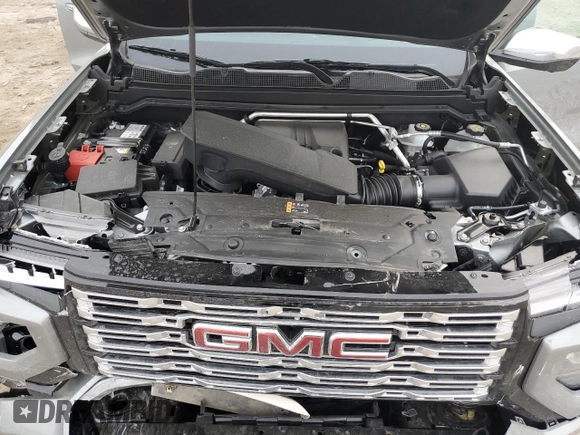 2024 GMC Canyon 4WD Denali with VIN 1GTP6FEKXR1248564, listed as a Copart auction lot 43116895 with 7,044 mi miles and Salvage Title. Bid and sale history available at carsss.com. Image 13.