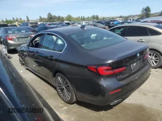 2023 BMW 5 Series 530e with VIN WBA13AG00PCL24045, listed as a Copart auction lot 84961634 with Not provided miles and Salvage title. Bid and sale history available at DreamBid. Image 2.