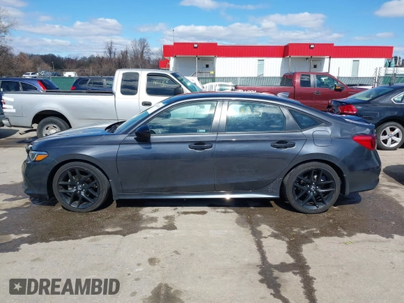 2022 Honda Civic Sport z VIN 2HGFE2F55NH587553, wystawiony jako IAAI lot #41816927 z przebiegiem 31 016 mil mil oraz . Historia ofert i sprzedaży dostępna na DreamBid. Obrazek 14.
