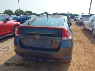 2010 Honda Insight EX with VIN JHMZE2H74AS027020, listed as a IAAI auction lot 42394875 with 248,003 mi miles and . Bid and sale history available at DreamBid. Image 16.