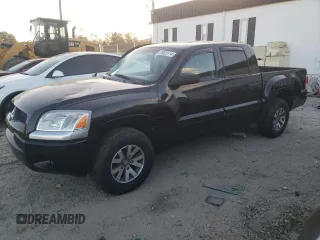 2008 Mitsubishi Raider LS z VIN 1Z7HC28K88S609126, wystawiony jako Copart lot #78622114 z przebiegiem 179 550 mil mil oraz Szkoda całkowita • Salvage title. Historia ofert i sprzedaży dostępna na DreamBid. Obrazek 1.