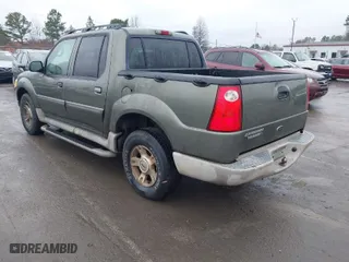 2003 Ford Explorer Sport Trac XLS with VIN 1FMZU77E13UC32685, listed as a IAAI auction lot 41428621 with 272,225 mi miles. Bid and sale history available at carsss.com. Image 3.