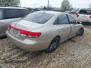 2009 Hyundai Azera Limited z VIN KMHFC46FX9A343230, wystawiony jako IAAI lot #42107823 z przebiegiem 26 319 mil mil oraz . Historia ofert i sprzedaży dostępna na DreamBid. Obrazek 4.