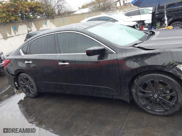 2018 Nissan Altima 2.5 SL with VIN 1N4AL3AP4JC288183, listed as a IAAI auction lot 41466582 with 100,858 mi miles. Bid and sale history available at carsss.com. Image 13.