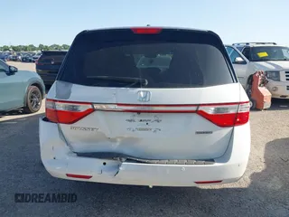 2012 Honda Odyssey Touring with VIN 5FNRL5H93CB125241, listed as a IAAI auction lot 42299053 with 125,549 mi miles and . Bid and sale history available at DreamBid. Image 16.