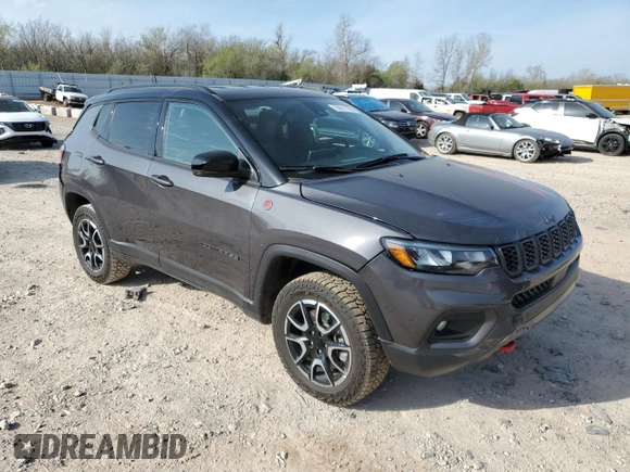 2024 Jeep Compass Trailhawk with VIN 3C4NJDDN7RT156682, listed as a Copart auction lot 50811795 with 8,088 mi miles and Salvage title. Bid and sale history available at DreamBid. Image 4.