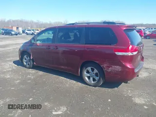 2012 Toyota Sienna LE AAS with VIN 5TDKK3DCXCS244605, listed as a IAAI auction lot 41516400 with 186,198 mi miles. Bid and sale history available at carsss.com. Image 14.