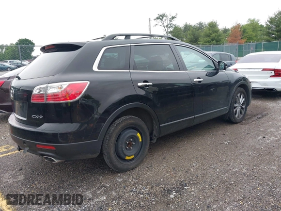 2012 Mazda CX-9 Grand Touring z VIN JM3TB2DAXC0338667, wystawiony jako IAAI lot #42260820 z przebiegiem 138 111 mil mil oraz . Historia ofert i sprzedaży dostępna na DreamBid. Obrazek 4.
