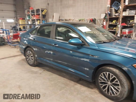 2019 Volkswagen Jetta SEL z VIN 3VWE57BU2KM116717, wystawiony jako IAAI lot #41951428 z przebiegiem 85 791 mil mil oraz . Historia ofert i sprzedaży dostępna na DreamBid. Obrazek 6.