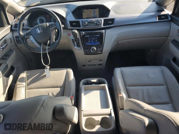 2014 Honda Odyssey Touring with VIN 5FNRL5H94EB116891, listed as a Copart auction lot 61400725 with 202,972 mi miles and Salvage title. Bid and sale history available at DreamBid. Image 8.