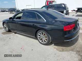 2012 Audi A8 L with VIN WAURVAFD5CN038949, listed as a IAAI auction lot 41914575 with 85,634 mi miles. Bid and sale history available at carsss.com. Image 3.