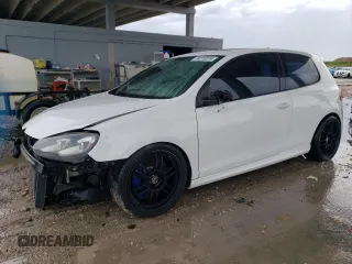 2012 Volkswagen Golf w/Sunroof & Navi z VIN WVWRF7AJ7CW266591, wystawiony jako Copart lot #74010074 z przebiegiem 192 664 mil mil oraz Szkoda całkowita • Salvage title. Historia ofert i sprzedaży dostępna na DreamBid. Obrazek 1.