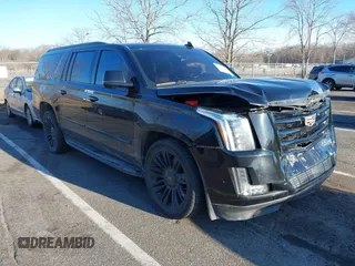 2015 Cadillac Escalade ESV Premium z VIN 1GYS4TKJXFR553256, wystawiony jako IAAI lot #41740751 z przebiegiem 173 035 mil mil oraz . Historia ofert i sprzedaży dostępna na DreamBid. Obrazek 1.