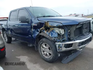 2015 Ford F-150 XLT with VIN 1FTEW1EG6FKD89143, listed as a IAAI auction lot 41640663 with 173,329 mi miles and . Bid and sale history available at carsss.com. Image 1.