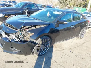 2016 Nissan Maxima SL z VIN 1N4AA6AP7GC395972, wystawiony jako IAAI lot #41357101 z przebiegiem 187 884 mil mil oraz . Historia ofert i sprzedaży dostępna na DreamBid. Obrazek 2.