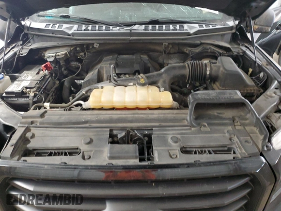 2015 Ford F-150 XLT with VIN 1FTEW1EP6FFC50333, listed as a Copart auction lot 59851945 with 112,633 mi miles and Salvage title. Bid and sale history available at DreamBid. Image 11.