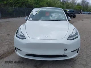 2022 Tesla Model Y Long Range z VIN 7SAYGDEE7NF385207, wystawiony jako IAAI lot #42054449 z przebiegiem 52 834 mil mil oraz . Historia ofert i sprzedaży dostępna na DreamBid. Obrazek 10.