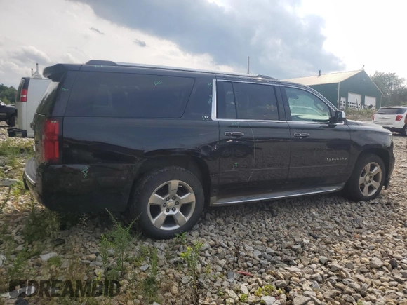 2015 Chevrolet Suburban LTZ with VIN 1GNSKKKC8FR199218, listed as a Copart auction lot 64147184 with 181,676 mi miles and Salvage Title. Bid and sale history available at DreamBid. Image 3.
