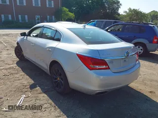 2015 Buick LaCrosse with VIN 1G4GA5G39FF284576, listed as a IAAI auction lot 42622666 with 102,504 mi miles and . Bid and sale history available at DreamBid. Image 3.