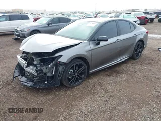 2025 Toyota Camry LE z VIN 4T1DAACK5SU554563, wystawiony jako IAAI lot #41788016 z przebiegiem 4 023 mil mil oraz . Historia ofert i sprzedaży dostępna na DreamBid. Obrazek 18.