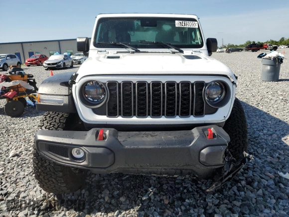 2025 Jeep Wrangler Rubicon with VIN 1C4PJXFN2SW525858, listed as a Copart auction lot 57415905 with 7,802 mi miles and Salvage title. Bid and sale history available at DreamBid. Image 5.