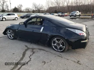 2003 Nissan 350Z Touring with VIN JN1AZ34E03T017128, listed as a Copart auction lot 48060195 with 0 mi miles and Salvage Title. Bid and sale history available at carsss.com. Image 2.
