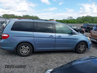 2007 Honda Odyssey EX z VIN 5FNRL38467B087065, wystawiony jako IAAI lot #42204370 z przebiegiem 242 844 mil mil oraz . Historia ofert i sprzedaży dostępna na DreamBid. Obrazek 14.